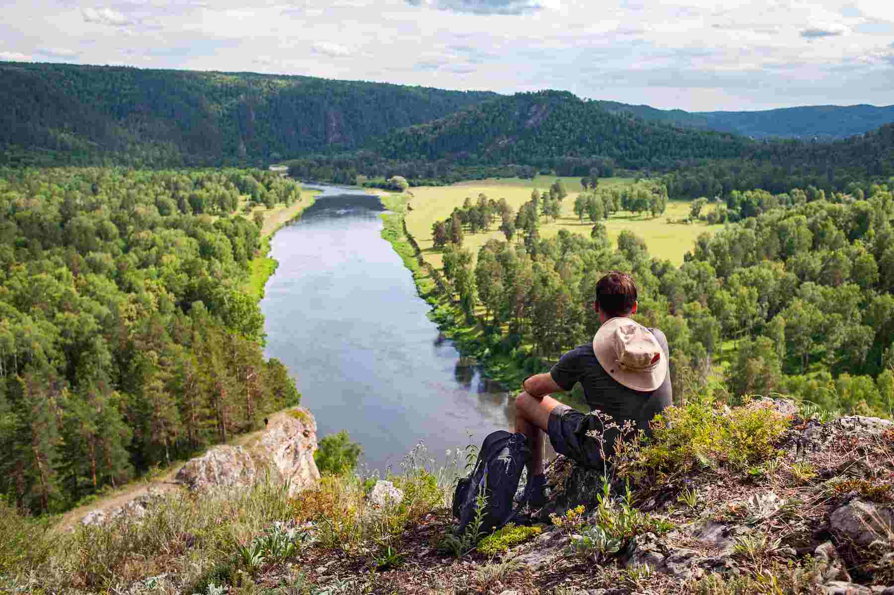 tourist-with-backpack-camera-rock-enjoying-view-river-valley (1).jpg tourist-with-backpack-camera-rock-enjoying-view-river-valley (1).jpg